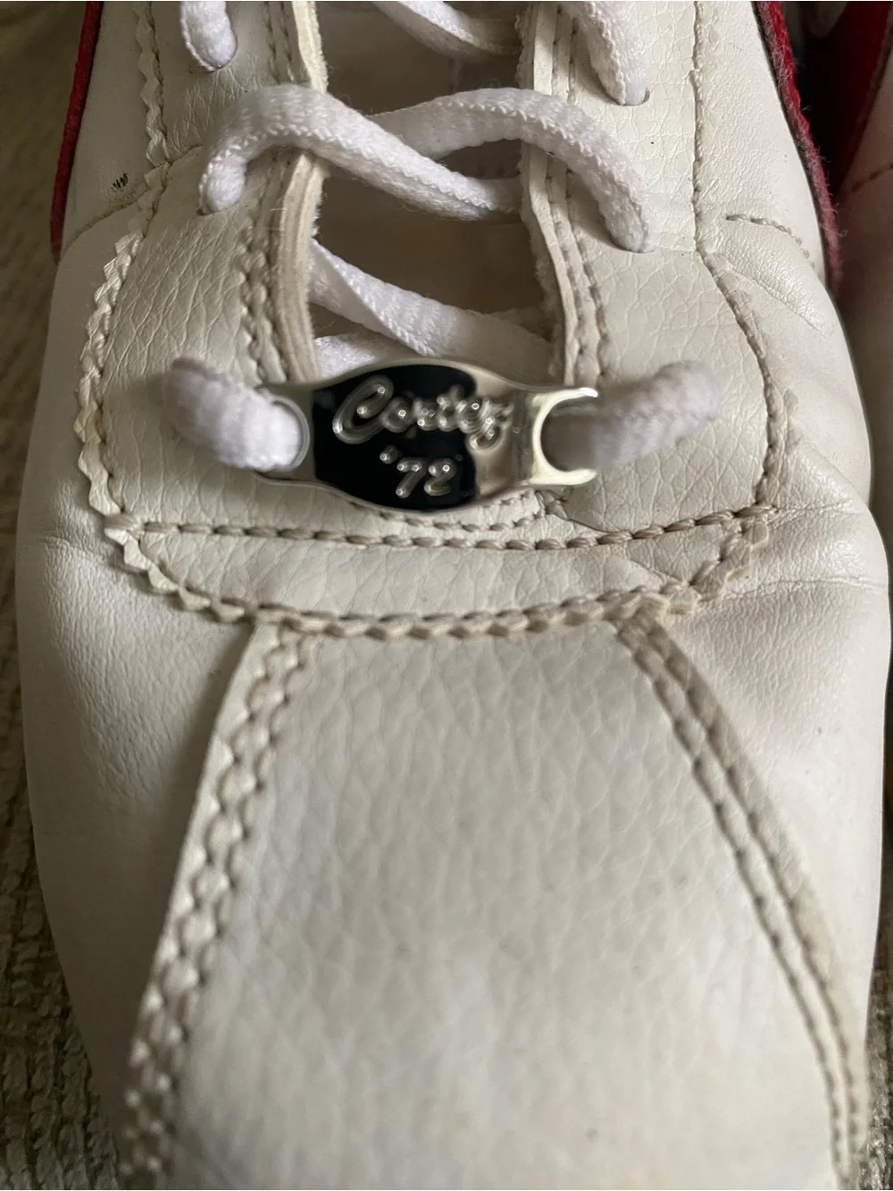 Nike Kids White Leather Sneakers with Red Swoosh